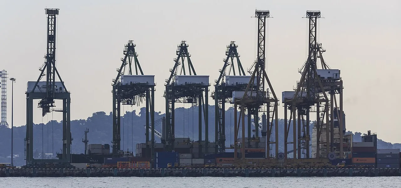 Shipping containers and cranes at a commercial port