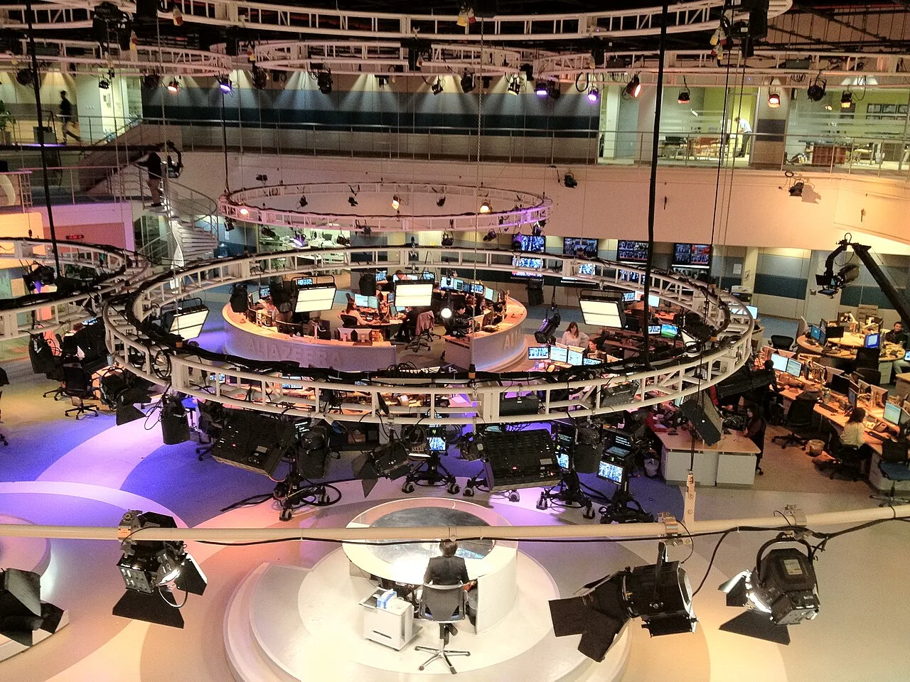 Journalists working in a digital newsroom